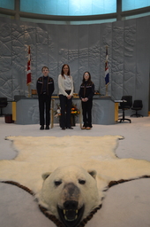 PH 518 - Page Photograph : Minister Caroline Wawzonek, MLA for Yellowknife South and Pages Zachary Messier and Mathile Plourde