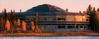 Legislative building in Yellowknife Northwest Territories captured in golden sunlight.